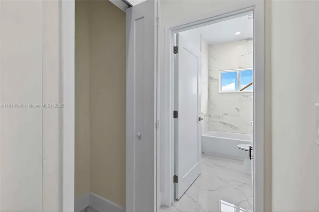 a view of a window in an empty room