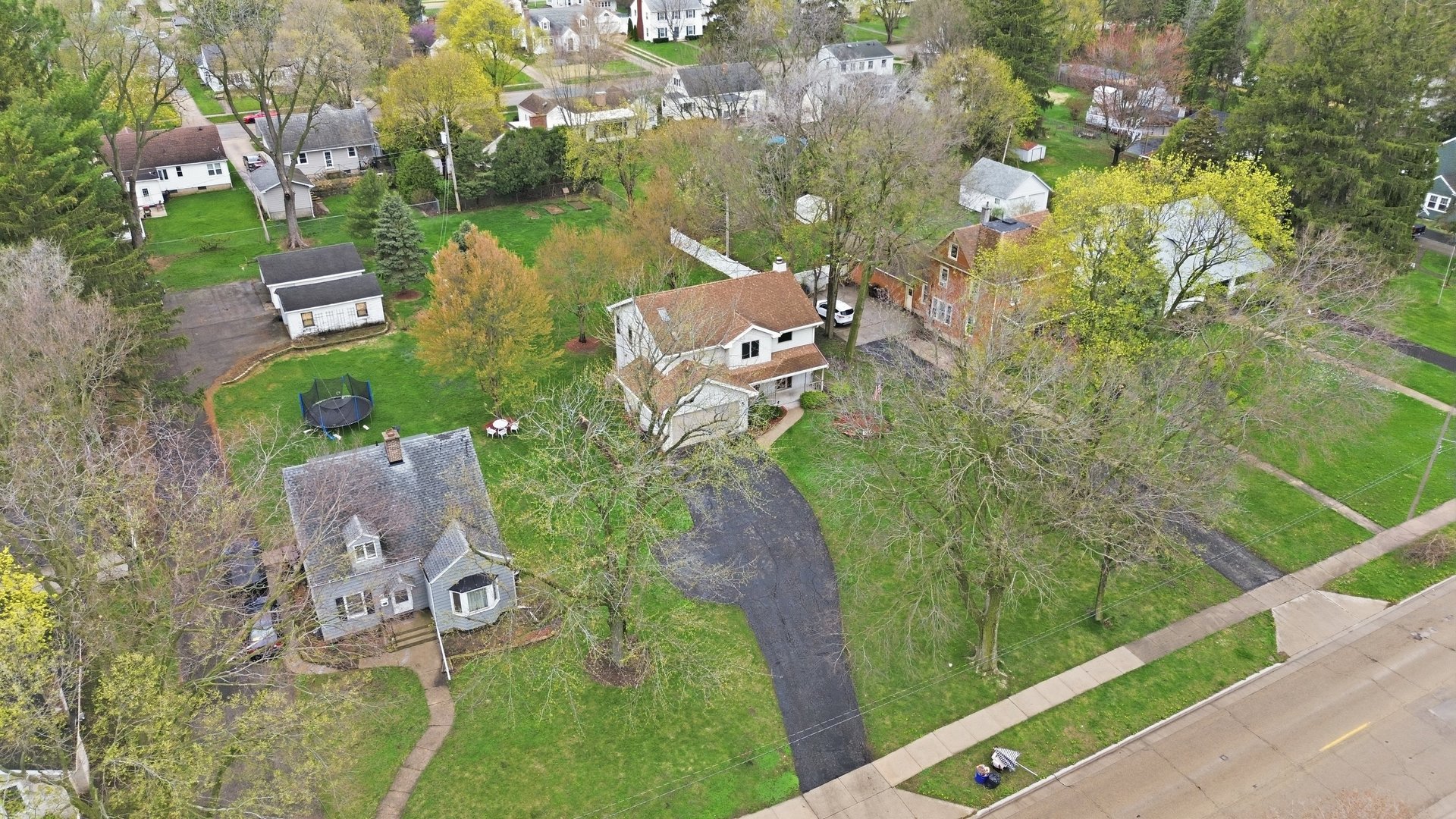 1016 North 7th Street Rochelle, IL 61068 - Photo 26 of 39 an aerial view of a house with a garden and lake view