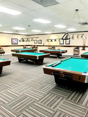 a view of a building with a door and porch