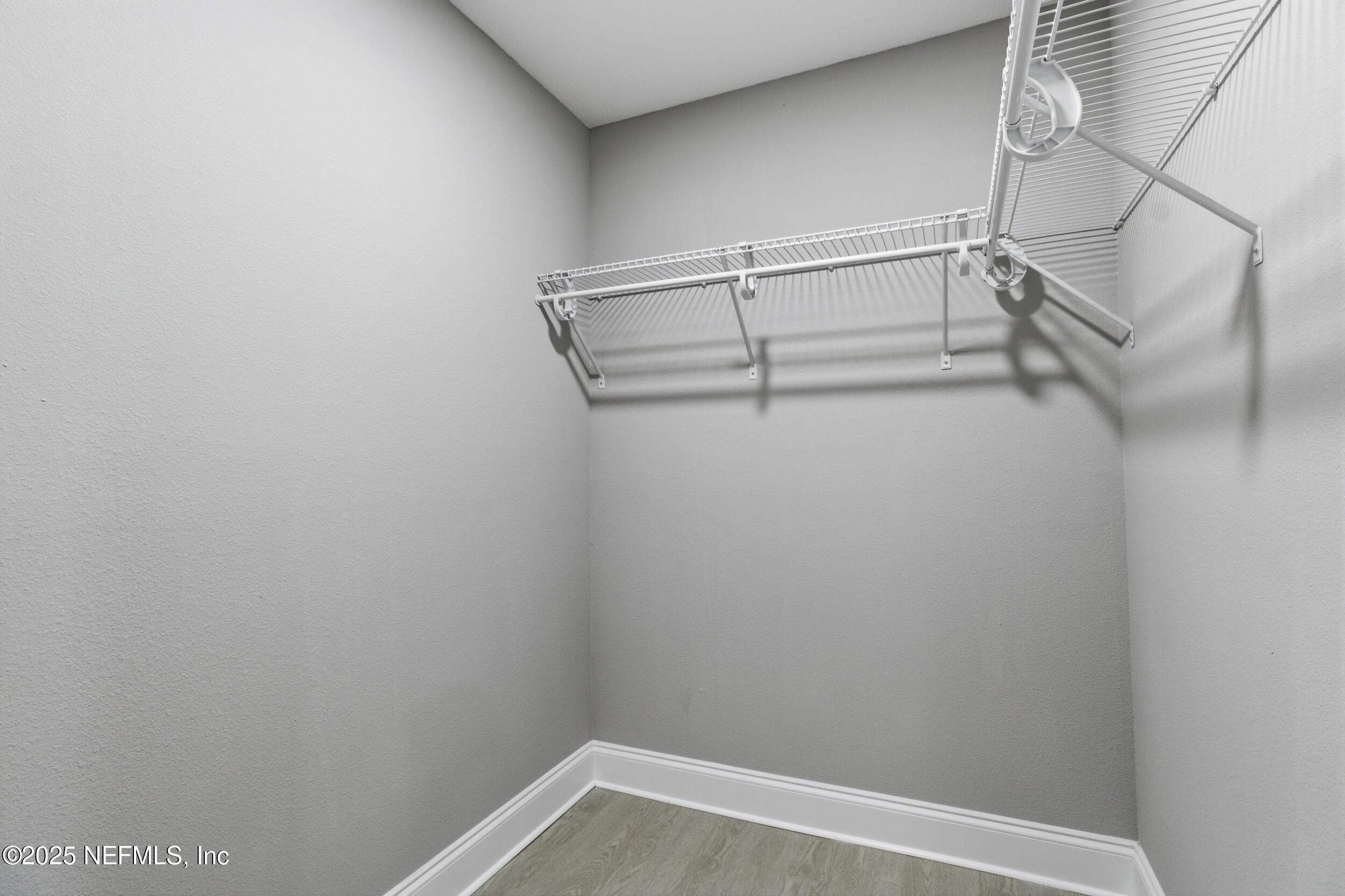 5475 Gable Lane Jacksonville, FL 32211 - Photo 15 of 36 a view of a room with racks on the wall