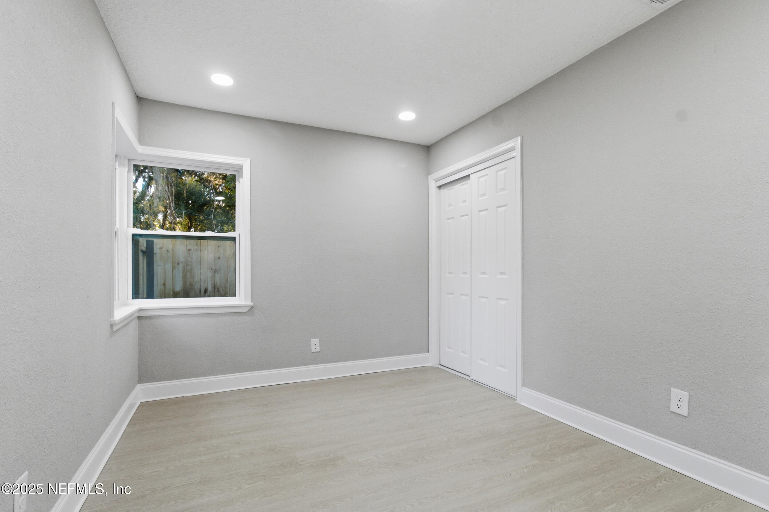 5475 Gable Lane Jacksonville, FL 32211 - Photo 20 of 36 an empty room with windows
