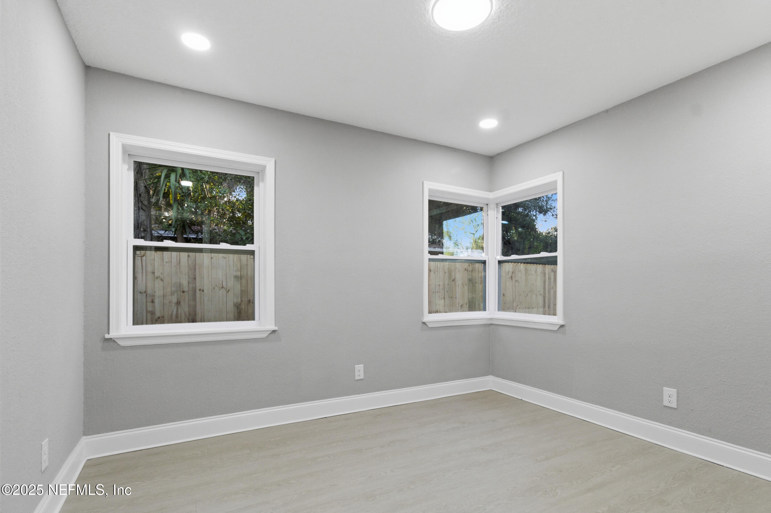 5475 Gable Lane Jacksonville, FL 32211 - Photo 21 of 36 an empty room with windows and closet