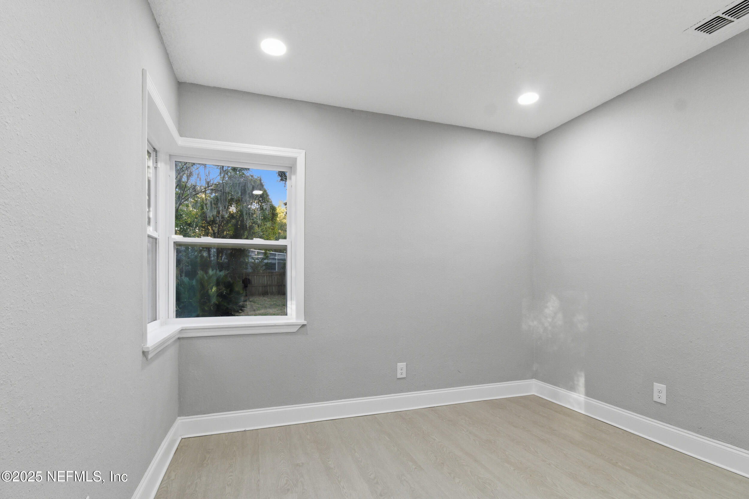 5475 Gable Lane Jacksonville, FL 32211 - Photo 22 of 36 an empty room with a window