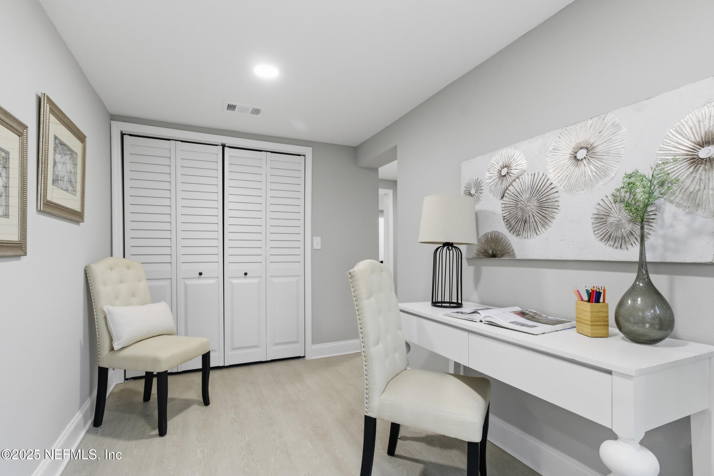 5475 Gable Lane Jacksonville, FL 32211 - Photo 27 of 36 a dining room with furniture and a potted plant