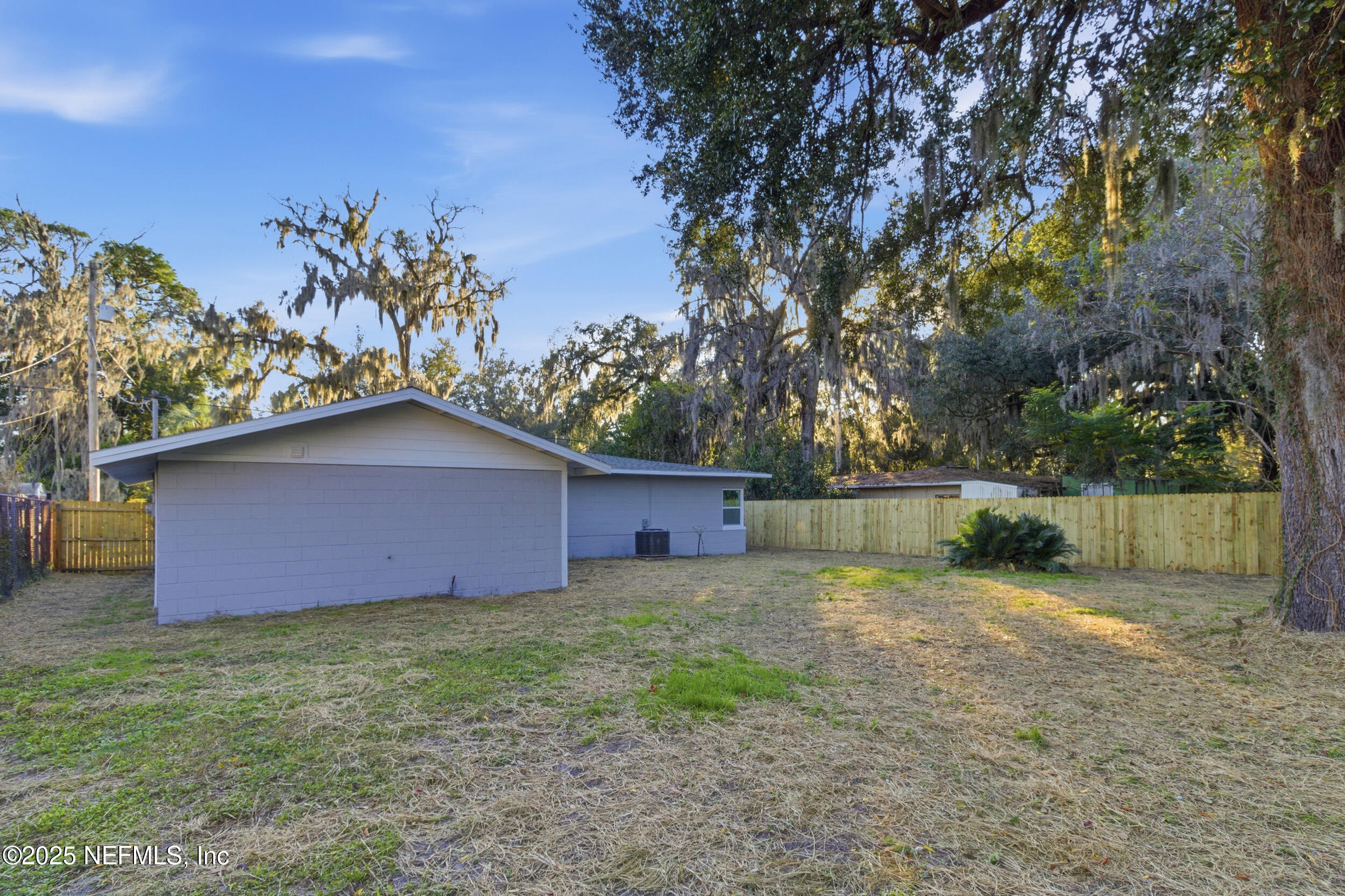5475 Gable Lane Jacksonville, FL 32211 - Photo 31 of 36 a backyard of a house with lots of green space