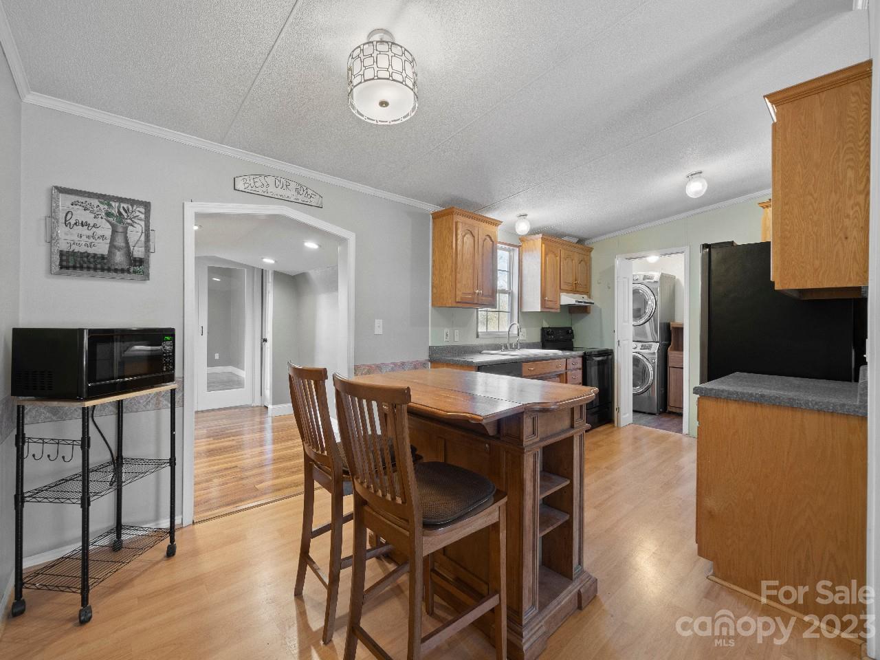 6580 Houser Farm Road Vale, NC 28168 - Photo 9 of 36 a large kitchen with a table and chairs in it
