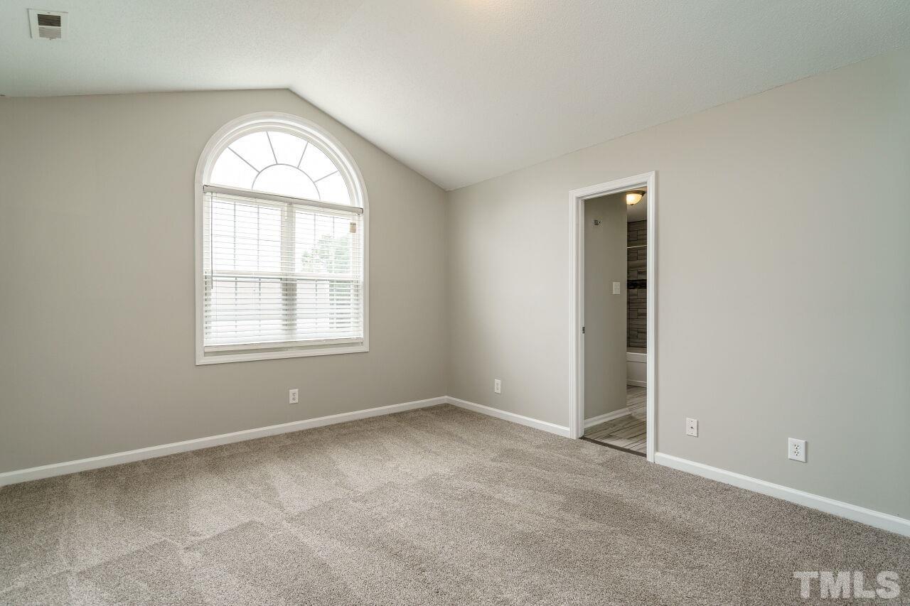 4509 Pinckney Place Raleigh, NC 27604 - Photo 19 of 28 an empty room with windows