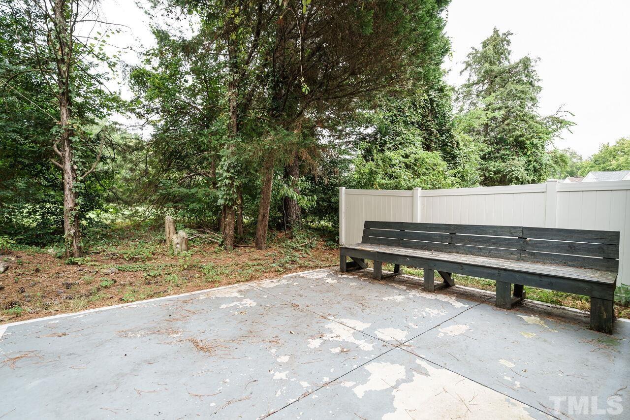 4509 Pinckney Place Raleigh, NC 27604 - Photo 26 of 28 a backyard view with a sitting space