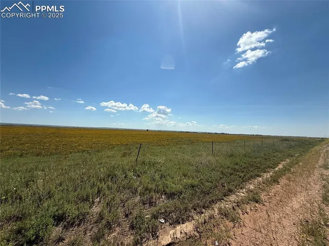 a view of a large room with a ocean