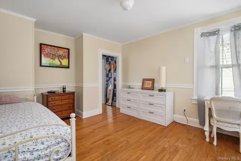 a bedroom with a bed and furniture