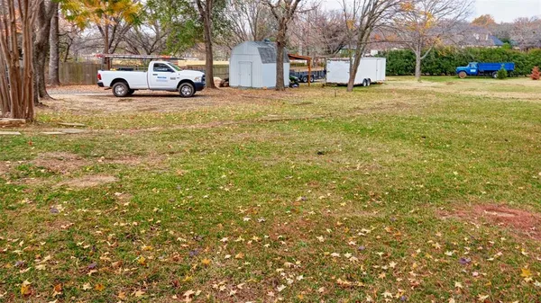 a view of a street with houses