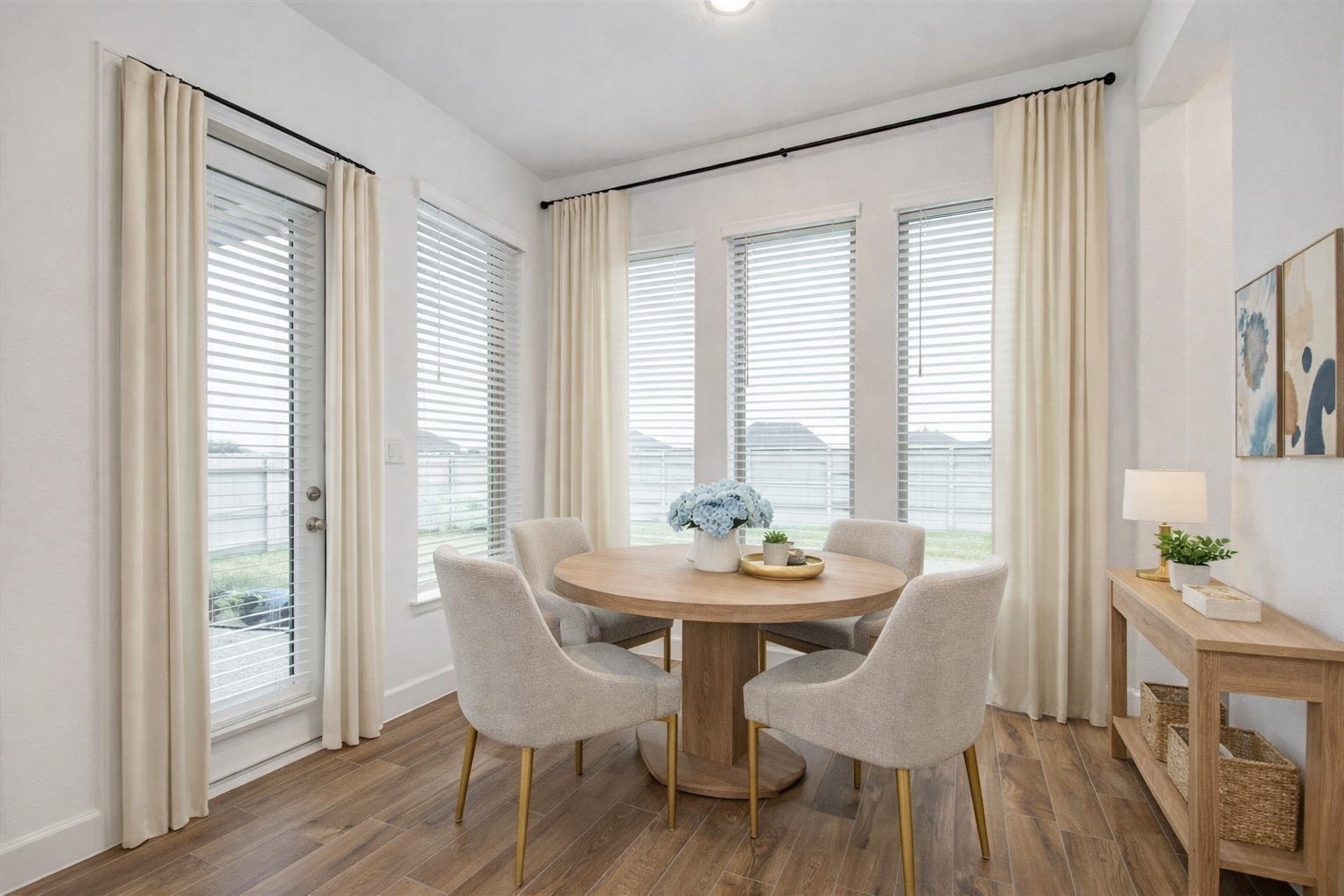 3011 Harbor Spring Way Manvel, TX 77578 - Photo 14 of 29 a view of a dining room with furniture and wooden floor