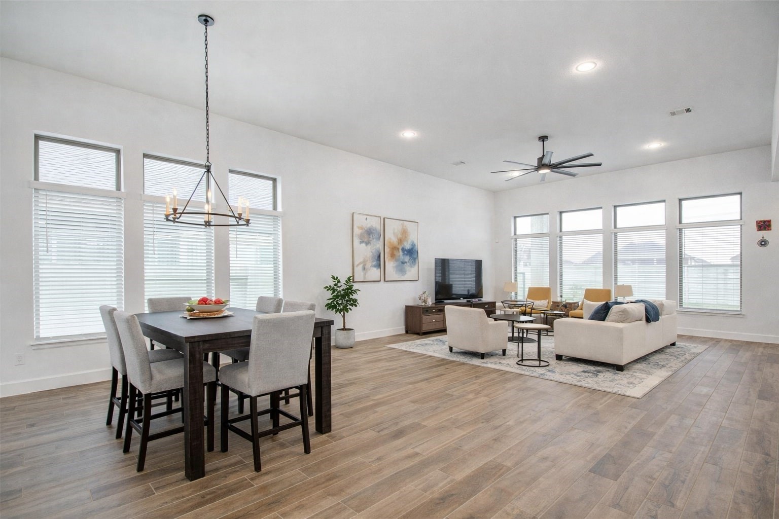 3011 Harbor Spring Way Manvel, TX 77578 - Photo 10 of 29 a view of a dining room with furniture window and wooden floor