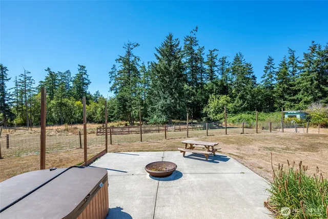 a view of a swimming pool with a patio