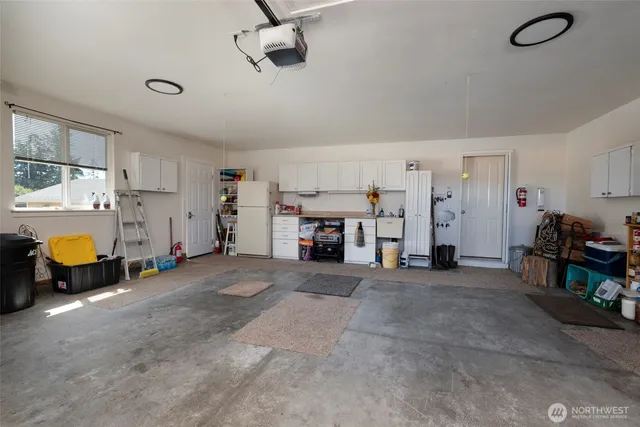 a view of a livingroom with furniture and a fireplace