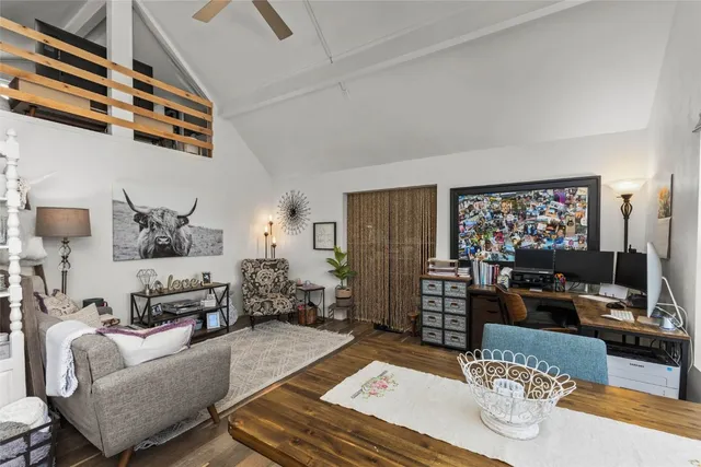 a bedroom with a bed and dresser