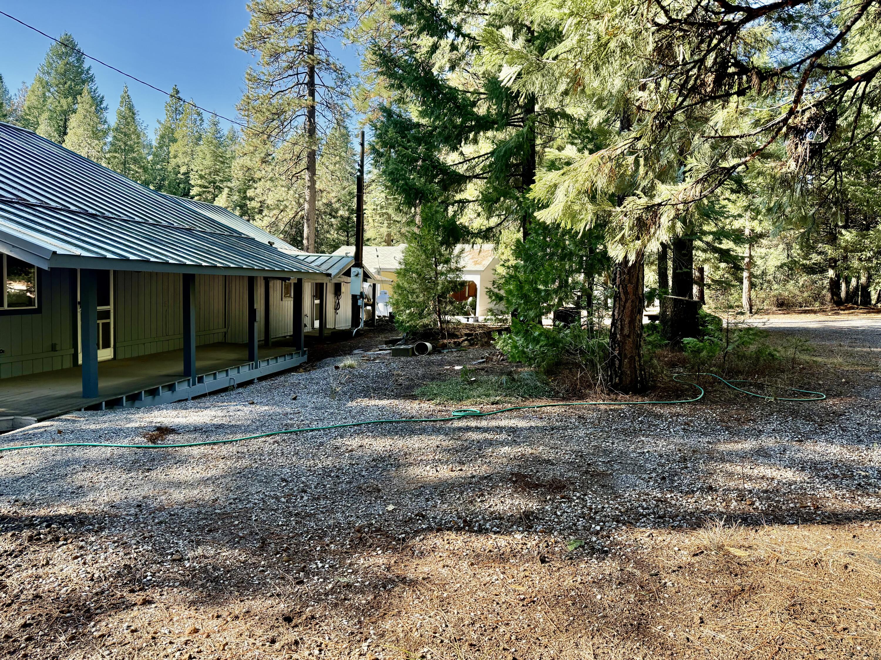 33250 Plateau Pines Road Shingletown, CA 96088 - Photo 14 of 52 side view of front of house