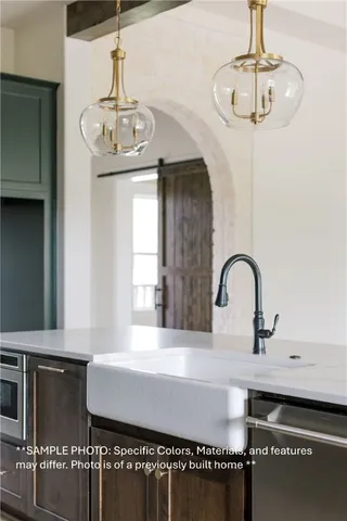 a view of a room with a chandelier furniture and windows