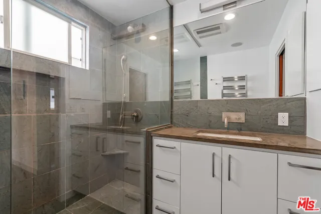 a view of front door with wooden floor