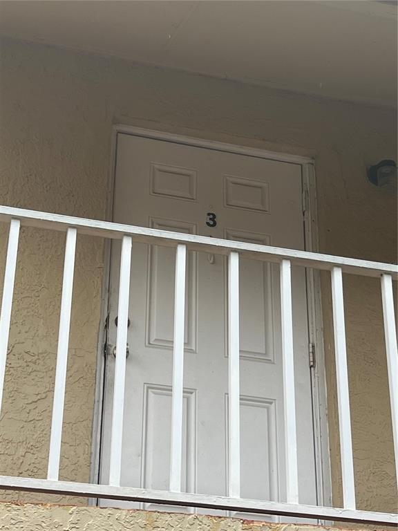 715 Michigan Court, Unit 3 St. Cloud, FL 34769 - Photo 3 of 15 a view of wooden floor