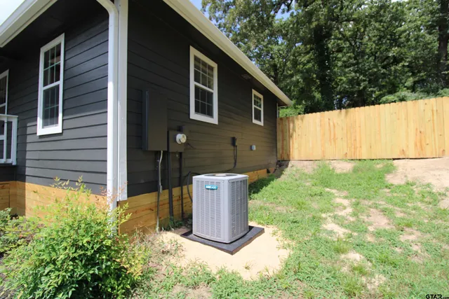 a view of a back yard of the house
