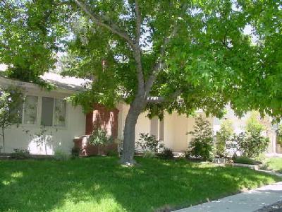 1309 Daly Road Ojai, CA 93023 - Photo 2 of 3 a front view of a house with garden