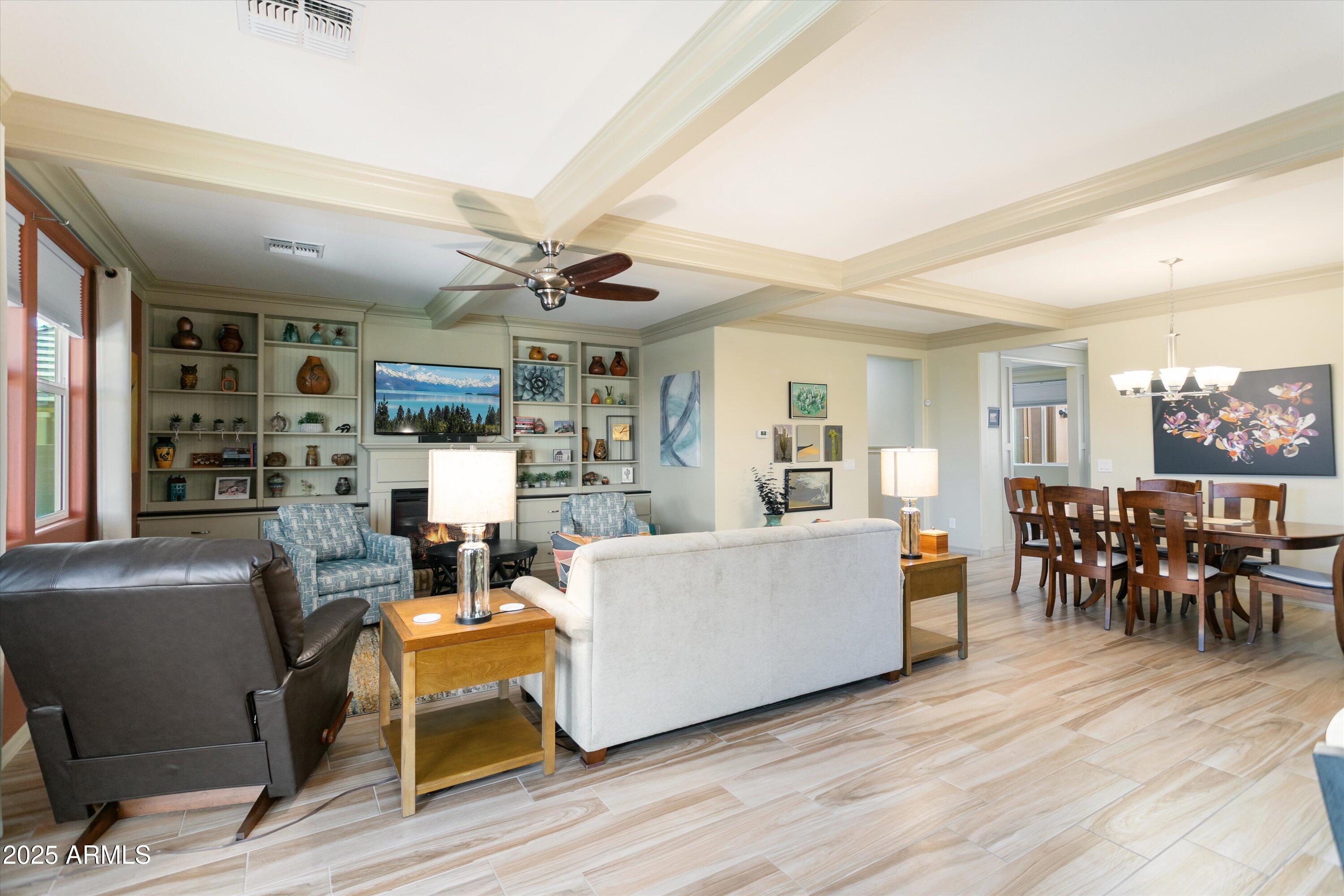 3197 North Springfield Street Buckeye, AZ 85396 - Photo 13 of 60 a living room with furniture and a wooden floor