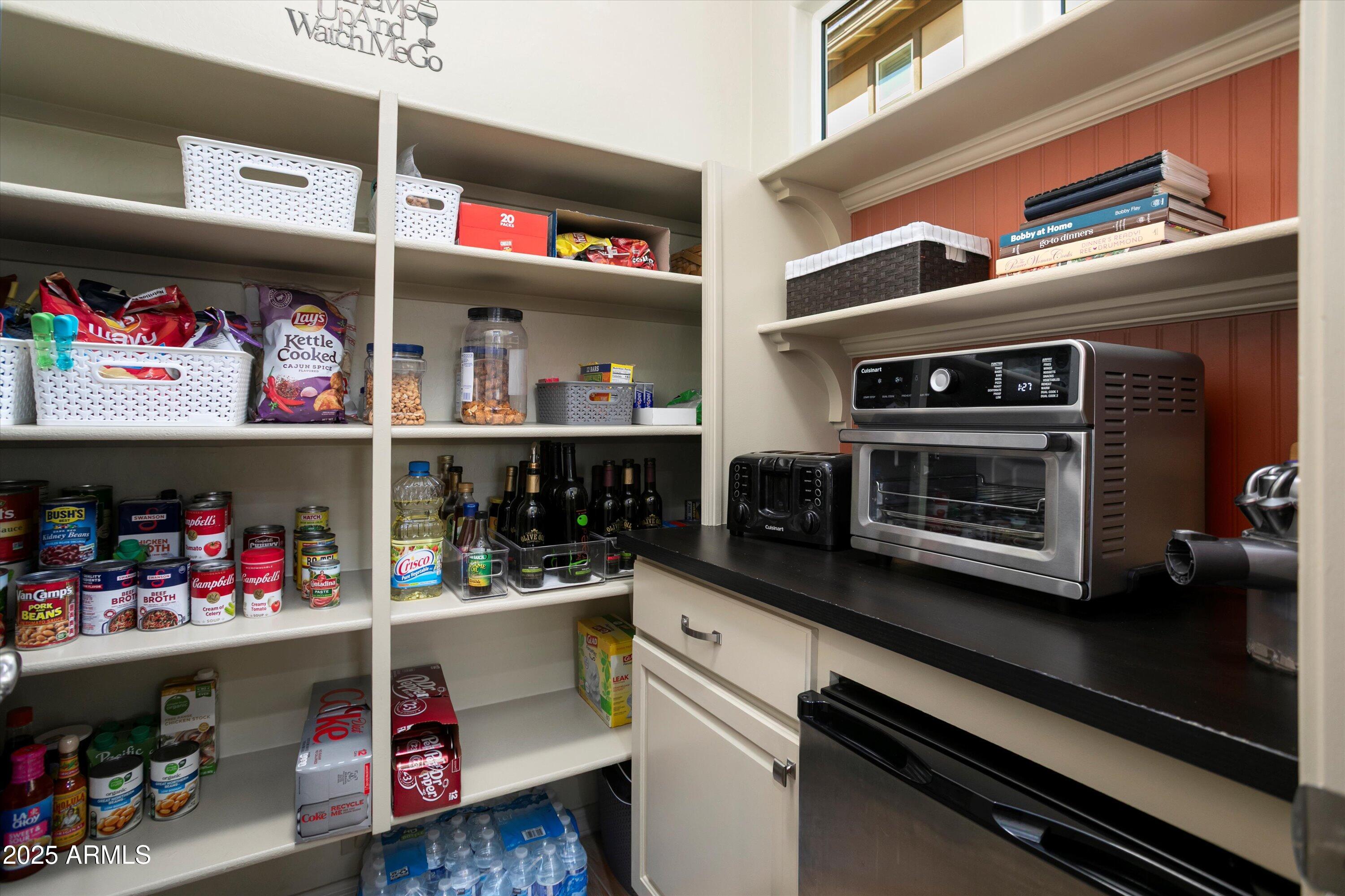 3197 North Springfield Street Buckeye, AZ 85396 - Photo 19 of 60 a store room with storage and utility
