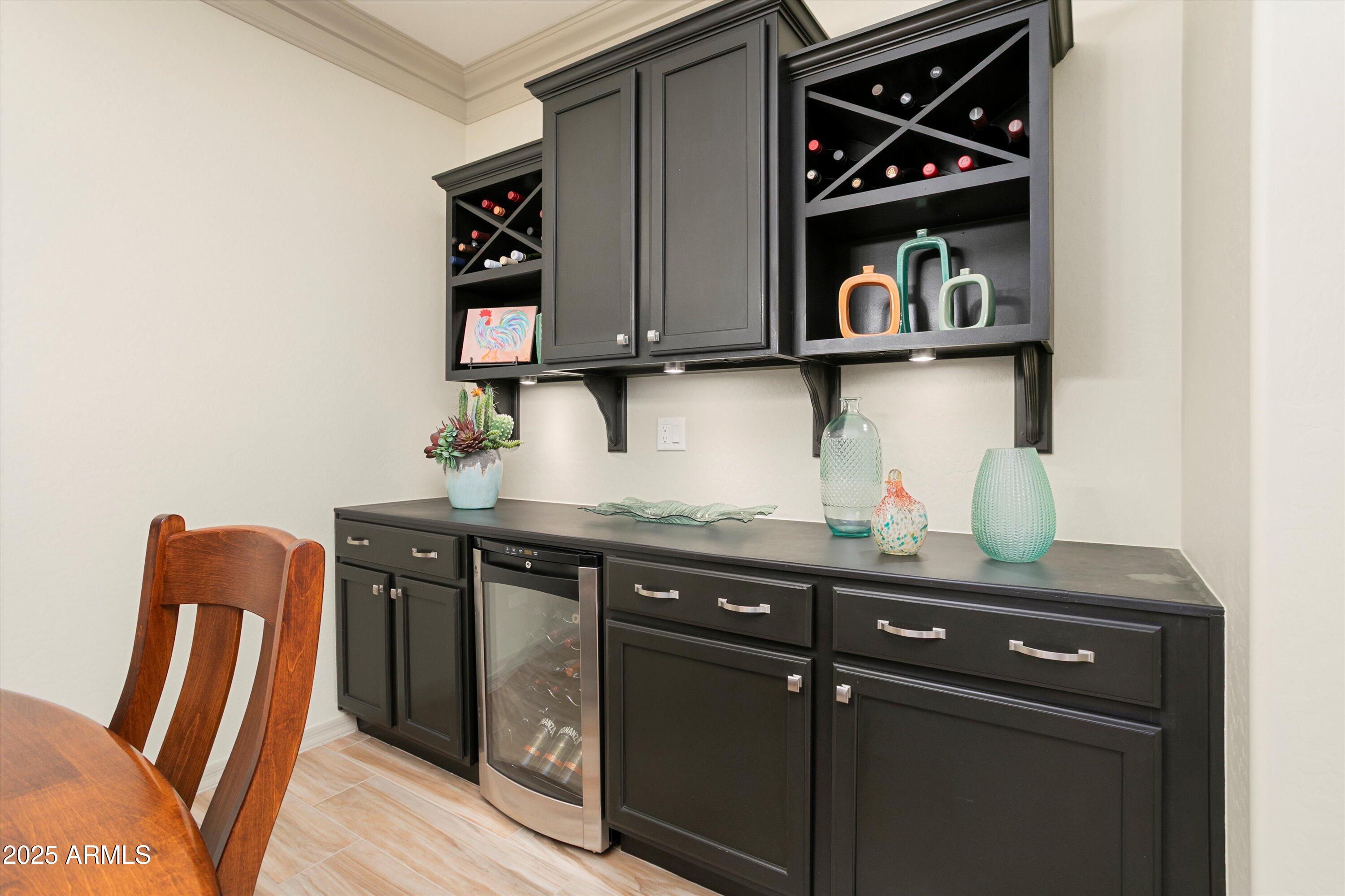 3197 North Springfield Street Buckeye, AZ 85396 - Photo 24 of 60 a view of storage and utility room with wooden floor