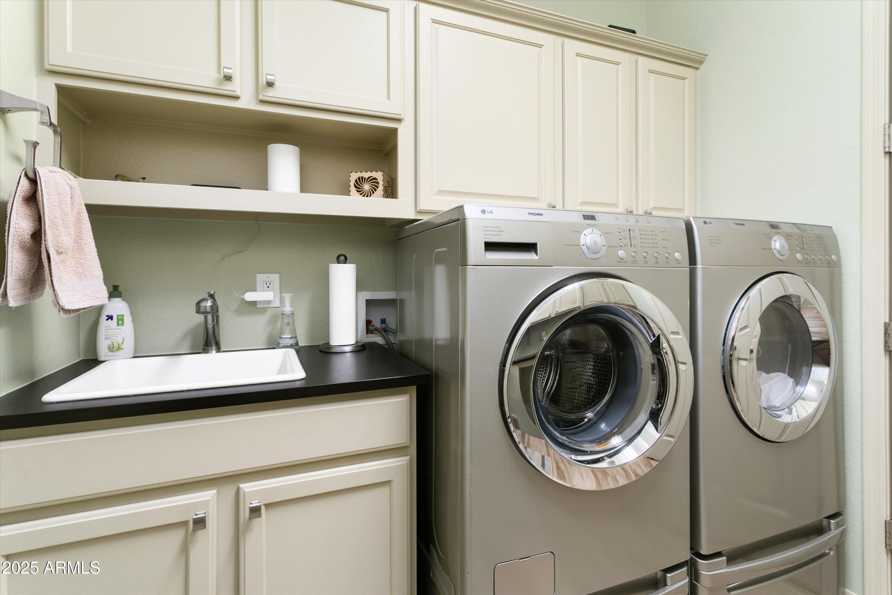 3197 North Springfield Street Buckeye, AZ 85396 - Photo 44 of 60 a kitchen with a cabinets and a sink