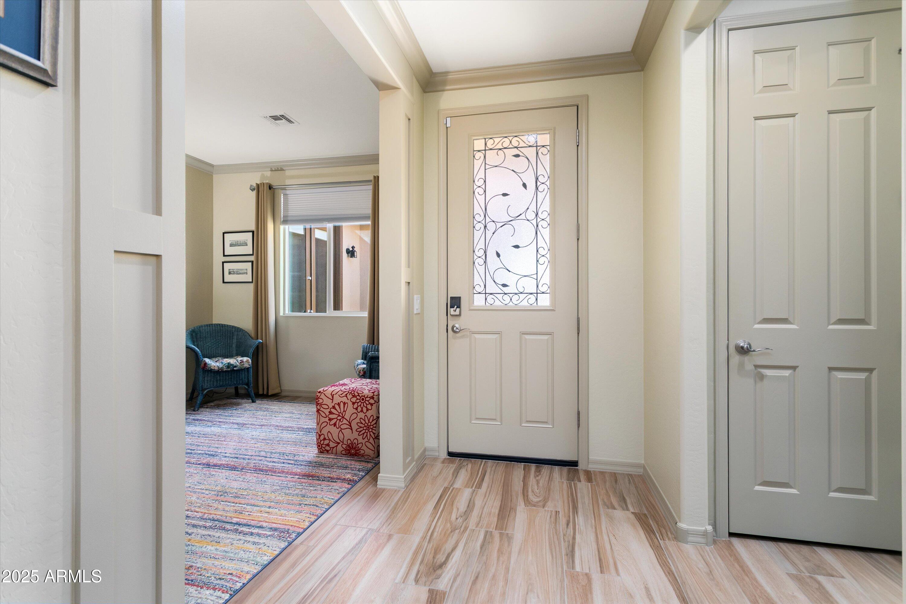 3197 North Springfield Street Buckeye, AZ 85396 - Photo 6 of 60 a bedroom with a bed and a window