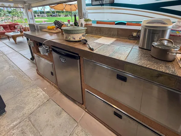 a kitchen with a stove and a sink
