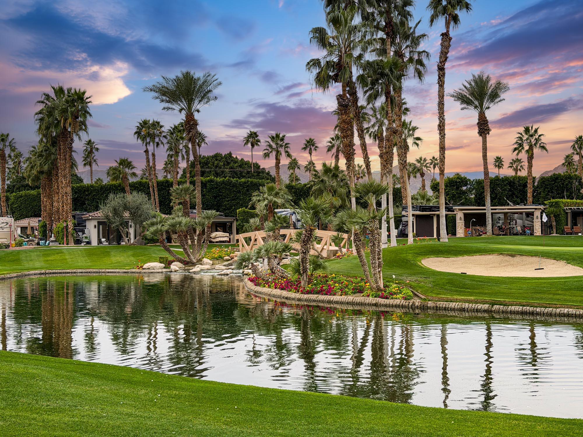 80394 Ave 48, Unit 303 Indio, CA 92201 - Photo 8 of 16 a view of a lake with a garden