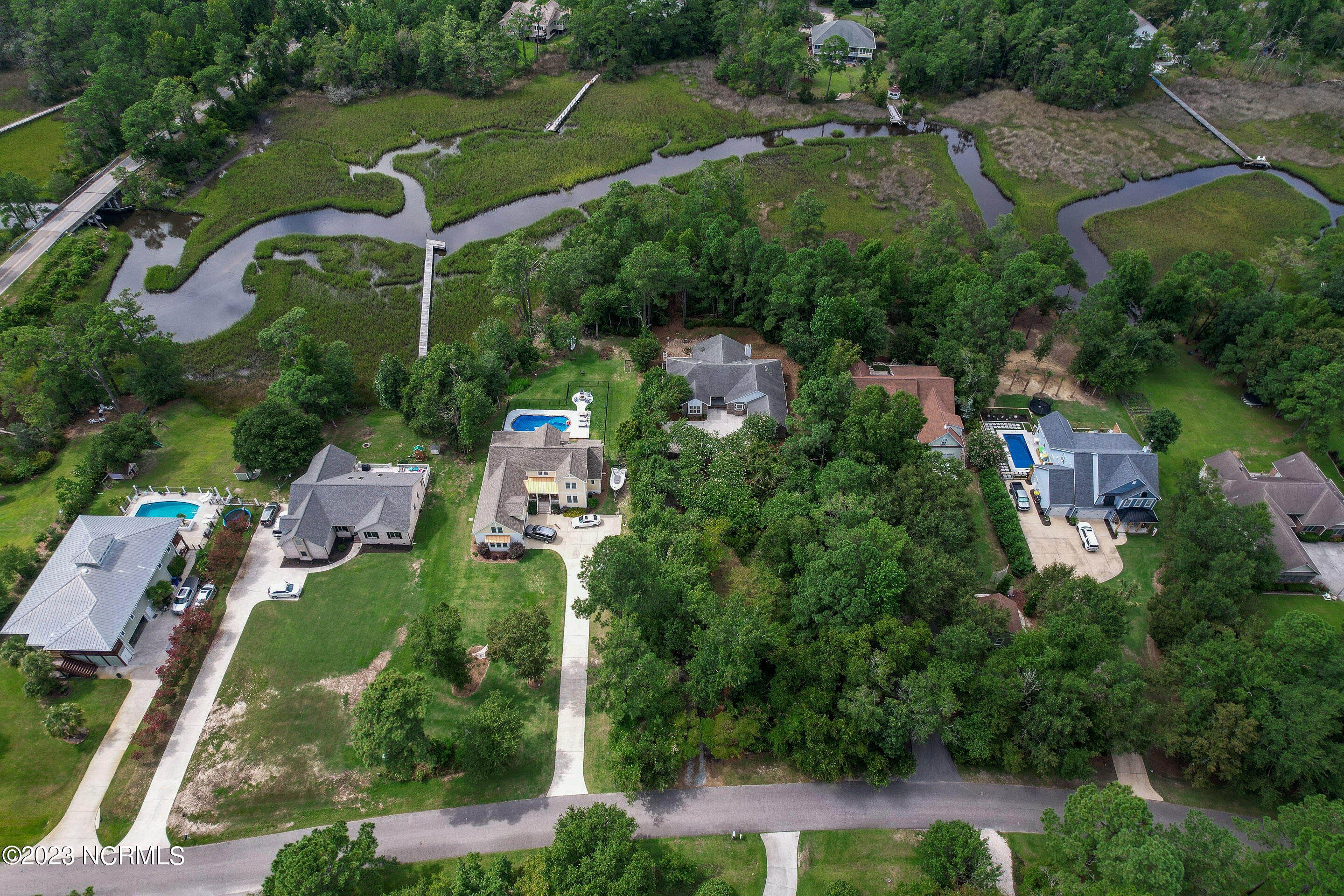 704 Cordgrass Road Hampstead, NC 28443 - Photo 39 of 39 Aerial with Creek 2