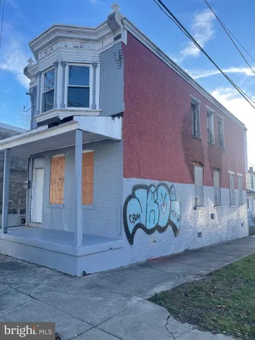 a front view of a building with garden
