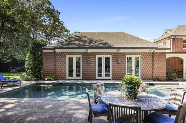 a garden view with a seating space