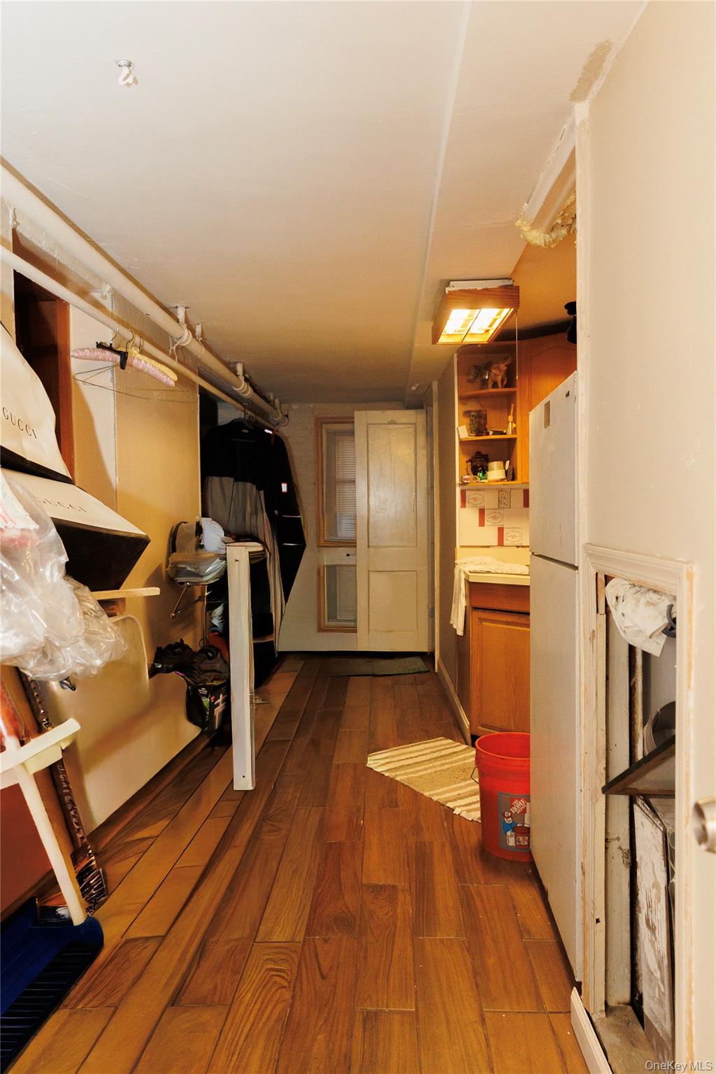 2440 Morgan Avenue Bronx, NY 10469 - Photo 15 of 23 Corridor featuring dark wood-style flooring