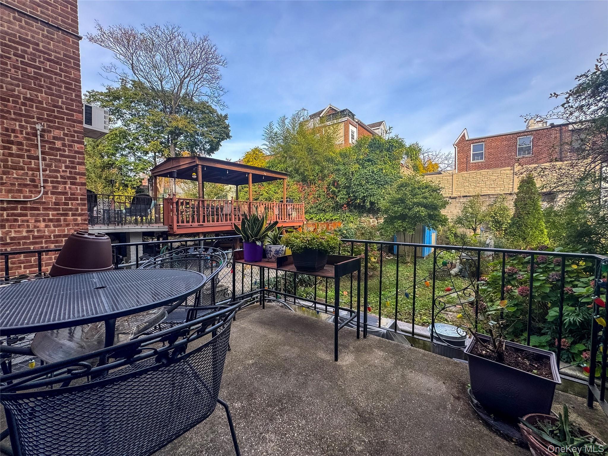 2440 Morgan Avenue Bronx, NY 10469 - Photo 20 of 23 View of patio with outdoor dining space and a gazebo