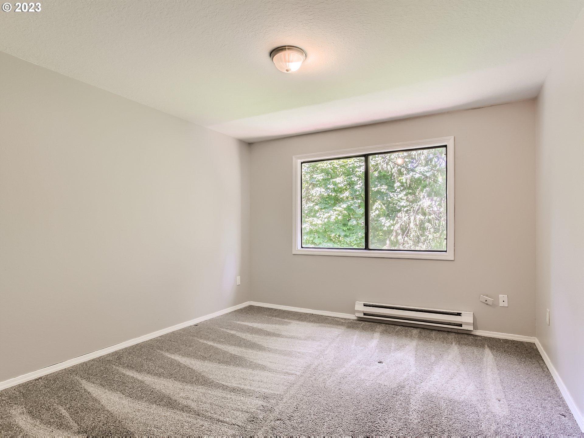 29530 Southwest Volley Street, Unit 30 Wilsonville, OR 97070 - Photo 11 of 29 an empty room with a window