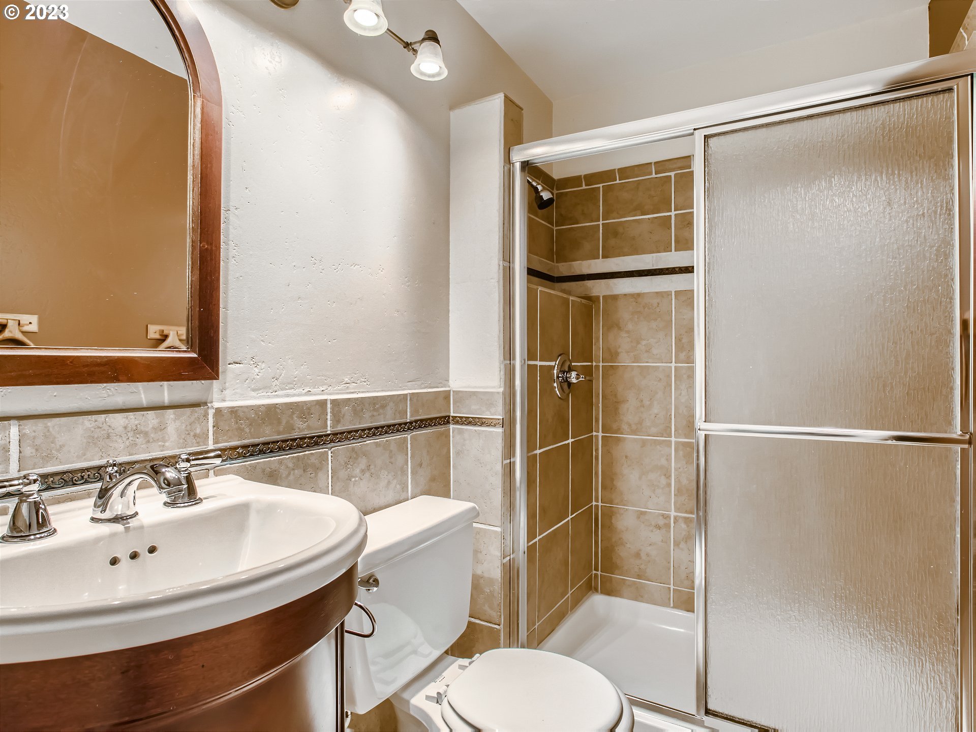 29530 Southwest Volley Street, Unit 30 Wilsonville, OR 97070 - Photo 13 of 29 a bathroom with a sink toilet and shower
