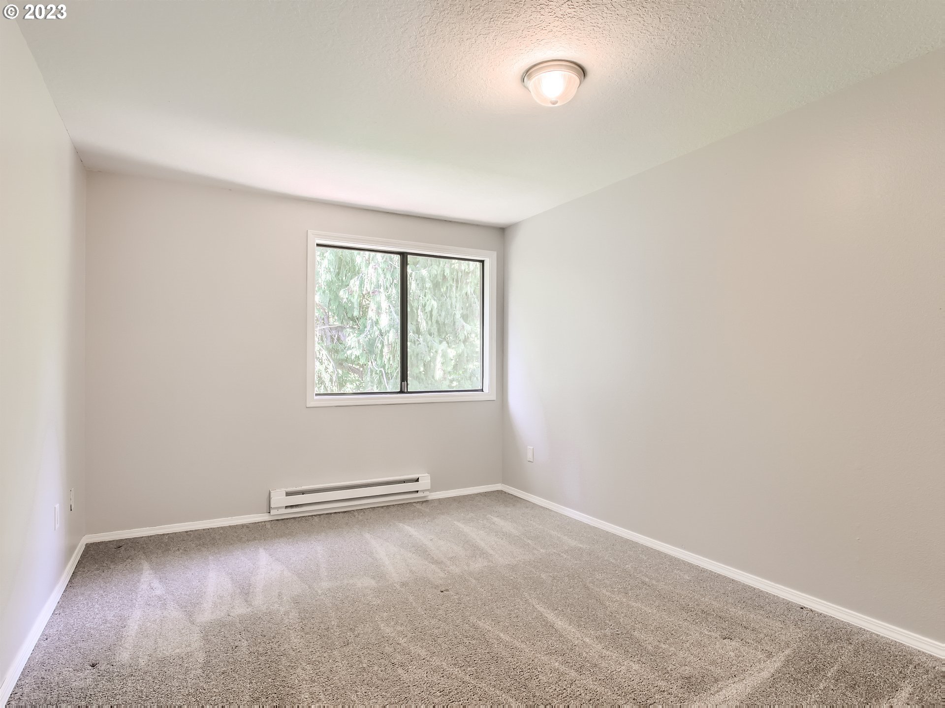 29530 Southwest Volley Street, Unit 30 Wilsonville, OR 97070 - Photo 15 of 29 an empty room with a window