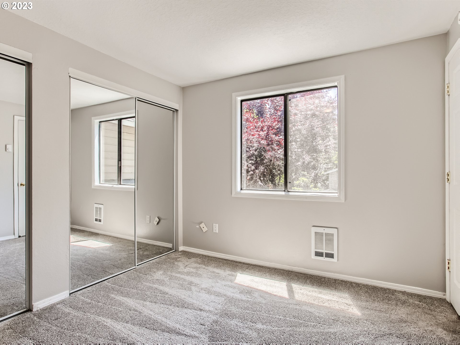 29530 Southwest Volley Street, Unit 30 Wilsonville, OR 97070 - Photo 17 of 29 an empty room with windows and closet