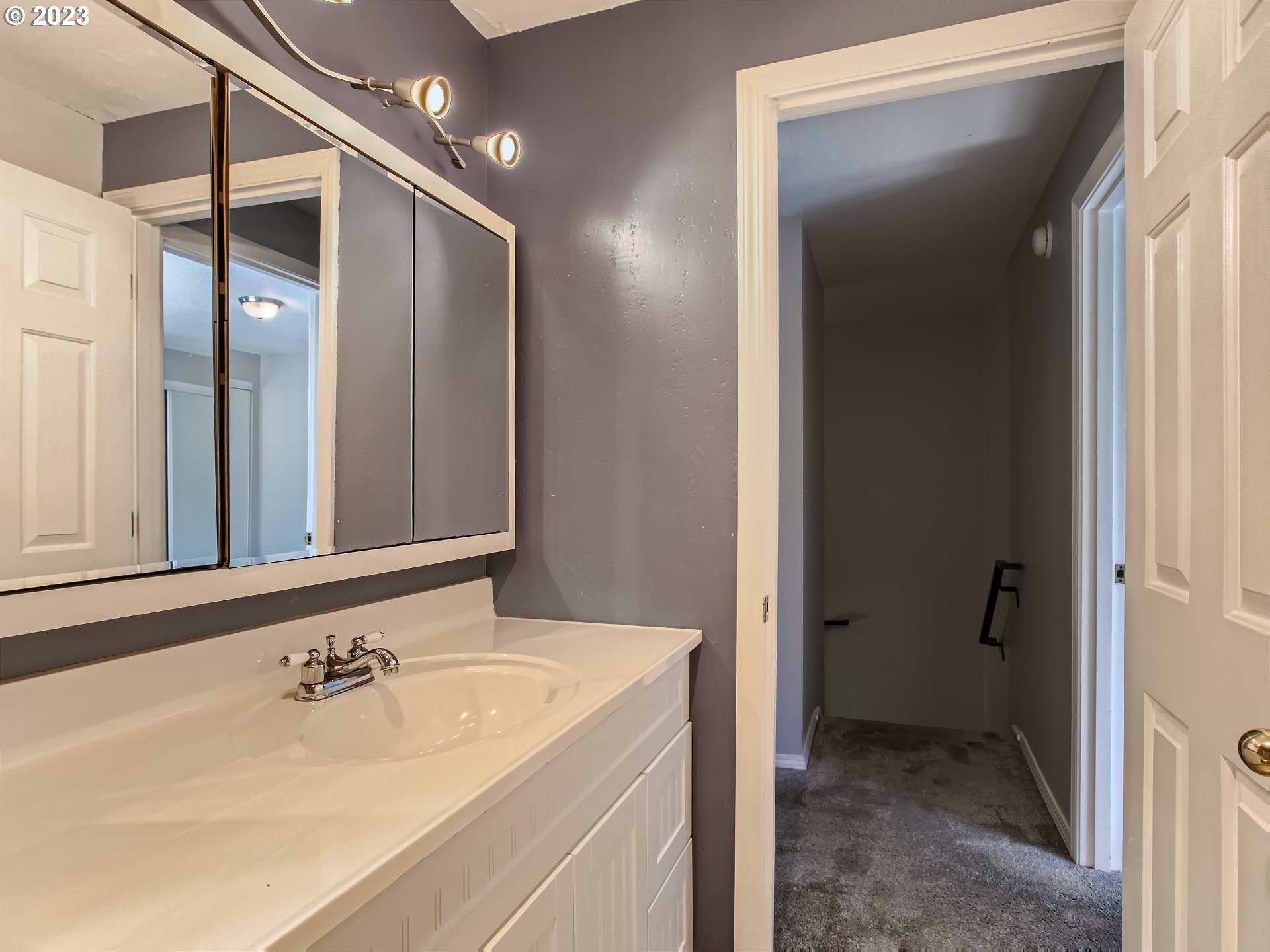 29530 Southwest Volley Street, Unit 30 Wilsonville, OR 97070 - Photo 20 of 29 a bathroom with a sink and a mirror
