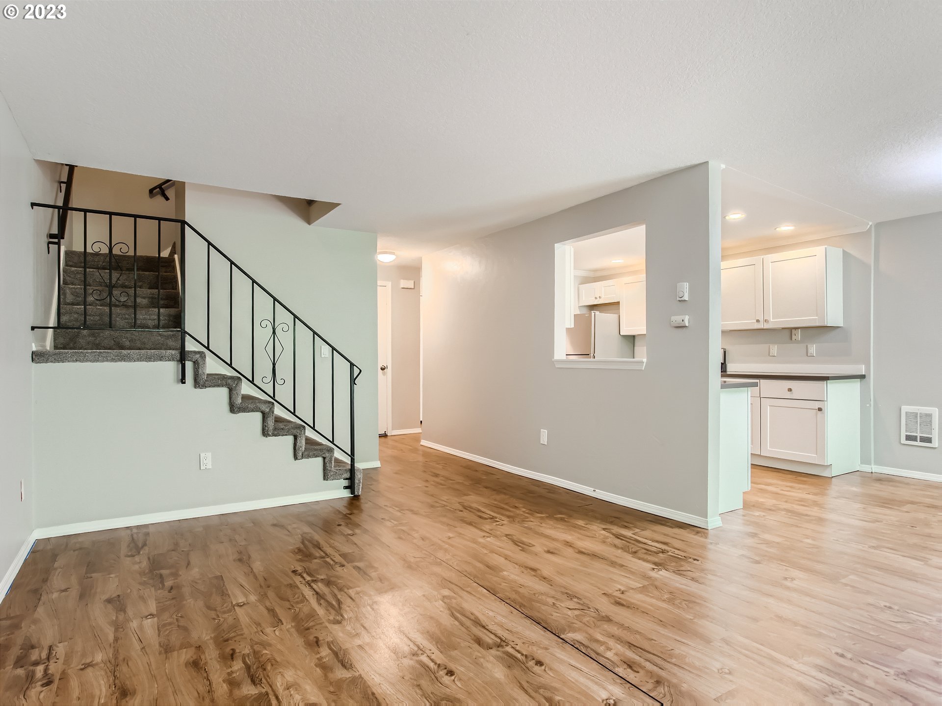 29530 Southwest Volley Street, Unit 30 Wilsonville, OR 97070 - Photo 6 of 29 a view of entryway and hall with wooden floor