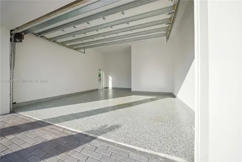 a view of a kitchen with cabinets