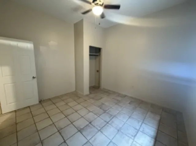 a bathroom with a shower and a toilet