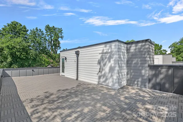 a view of a garden from a balcony