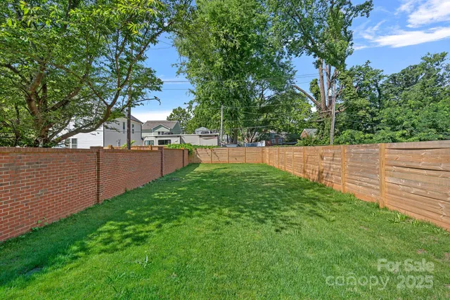 a view of a backyard with a garden