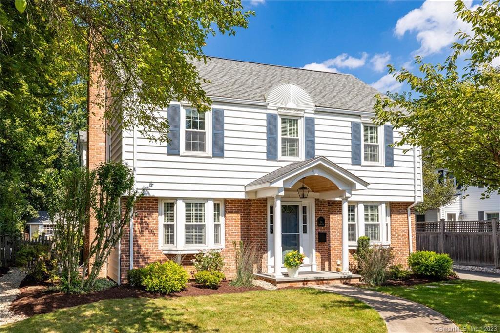 24 Linbrook Road West Hartford, CT 06107 - Photo 1 of 1 a front view of a house with a yard