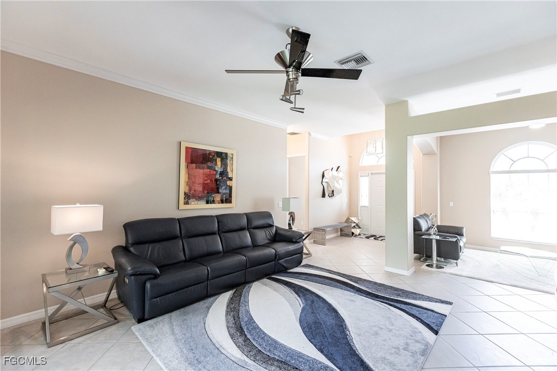 9013 West Ridge Court Fort Myers, FL 33912 - Photo 11 of 43 a living room with furniture and a wooden floor